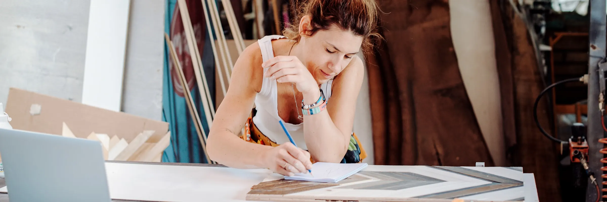  A woman works on her craft in a workshop