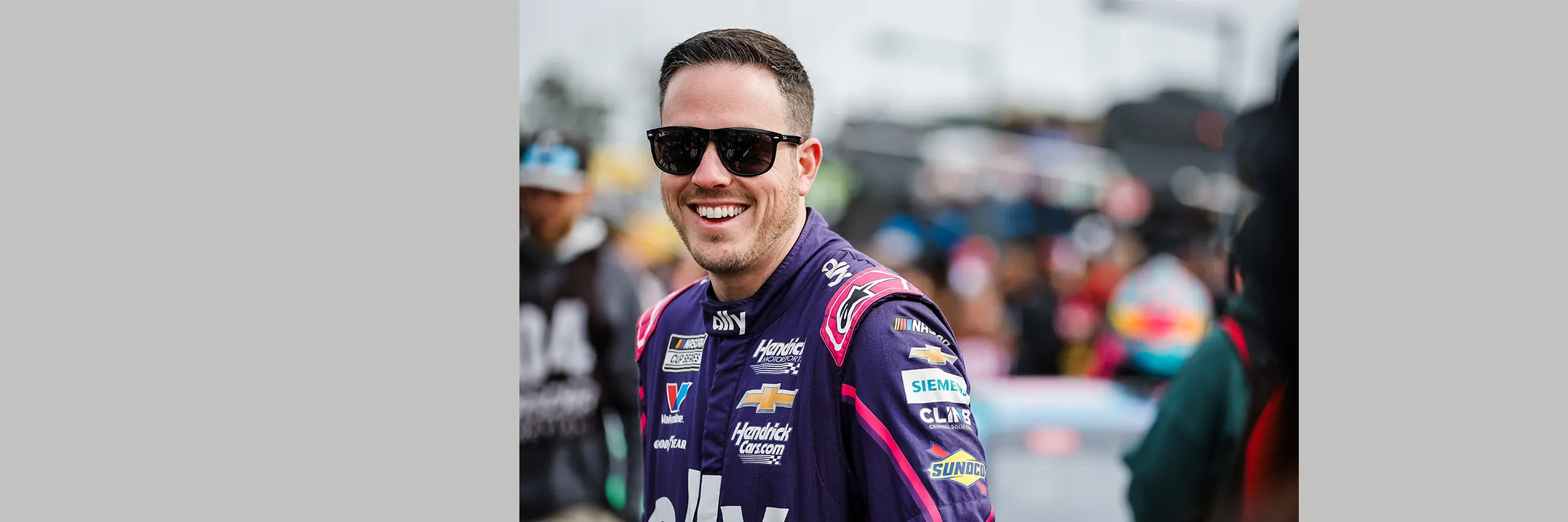 Alex Bowman, driver of Hendrick's #48 racecar smiles to fans at Daytona.