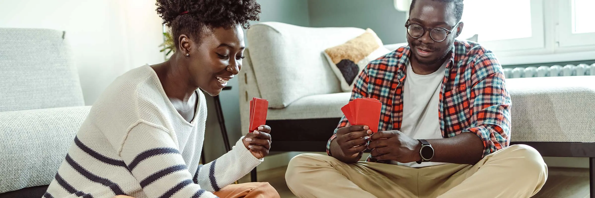 Image of a couple playing a board game