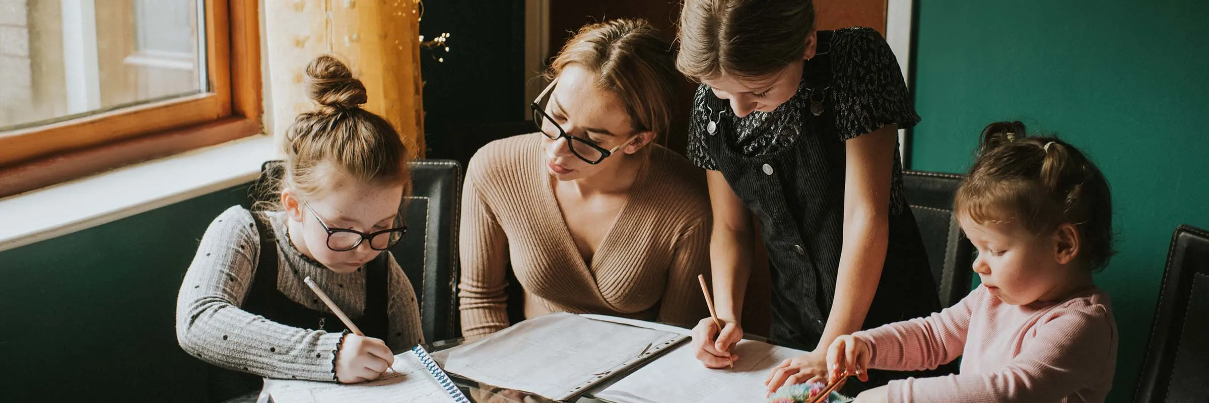 Mother Homeschooling her 3 Daughters 