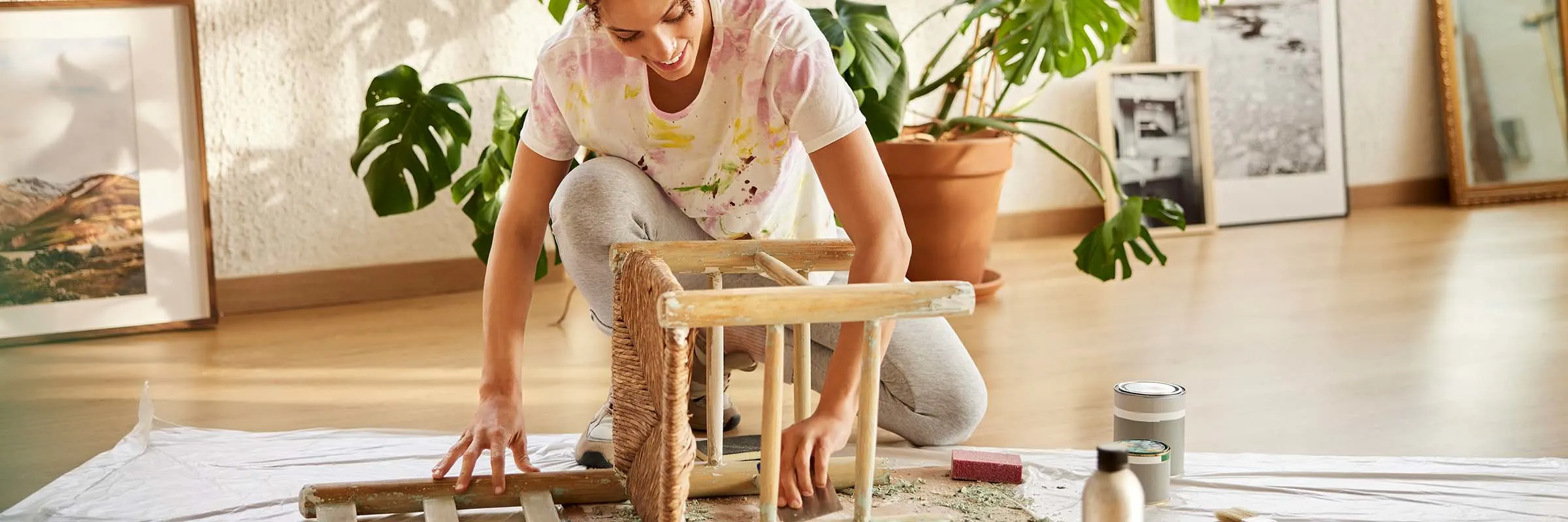 Young Woman Is Cleaning Wooden Seat At Home