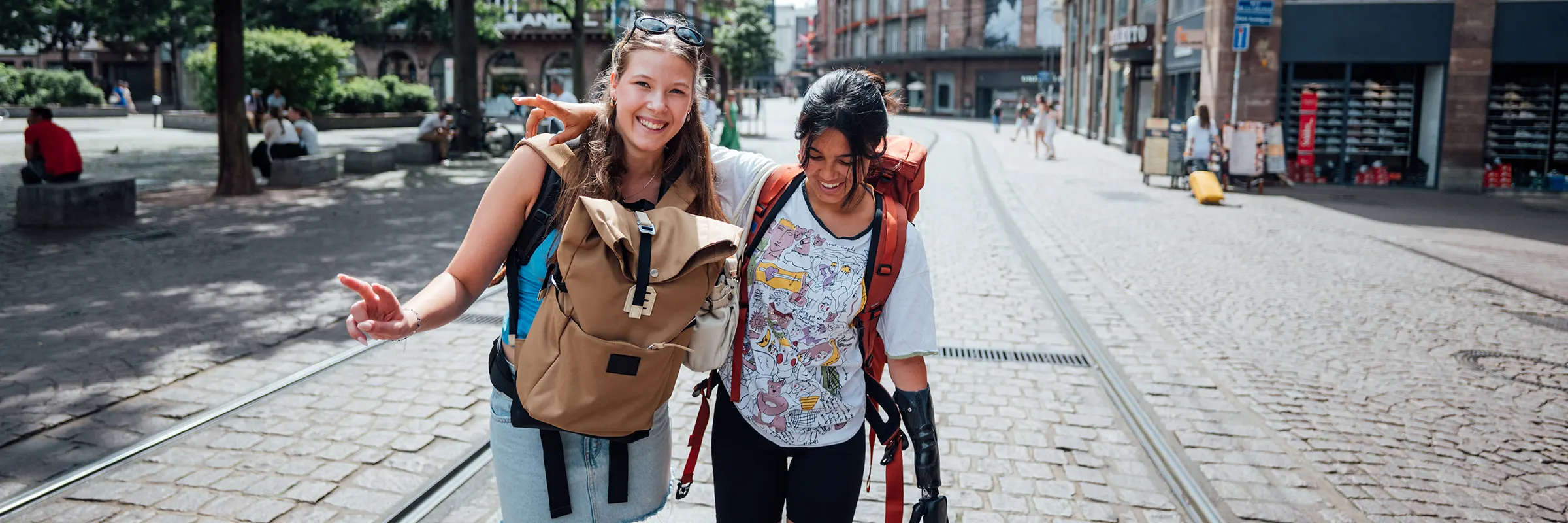  Two young friends backpacking in Europe. 