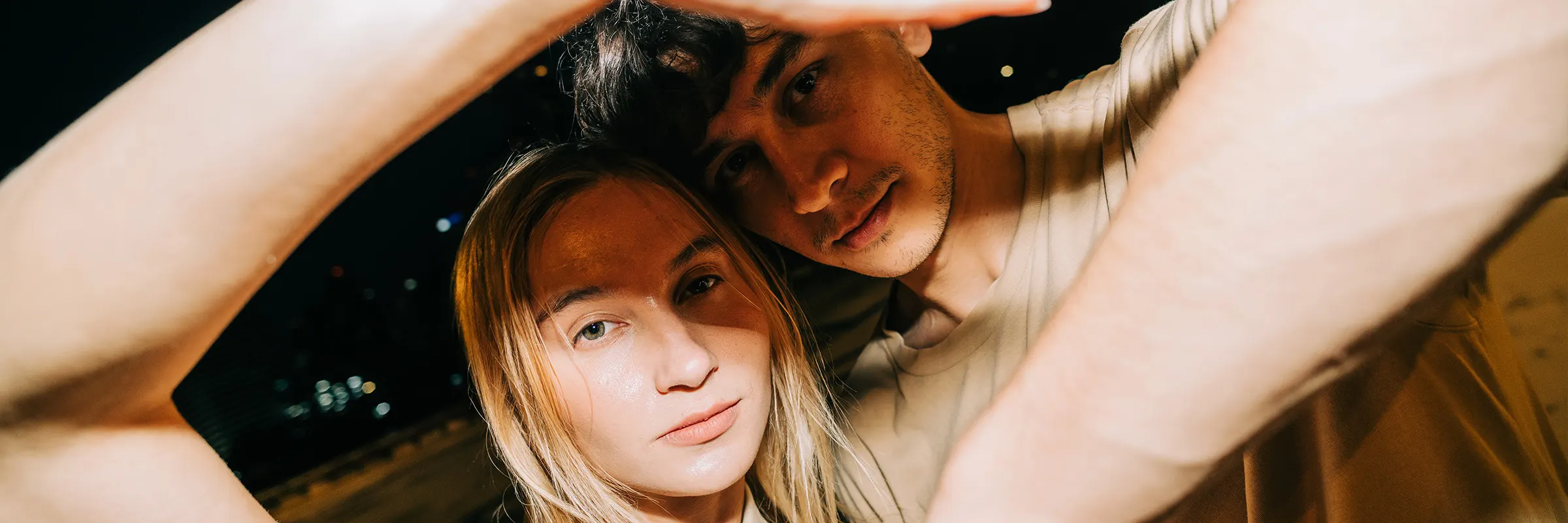 Young couple striking a pose for the camera. 