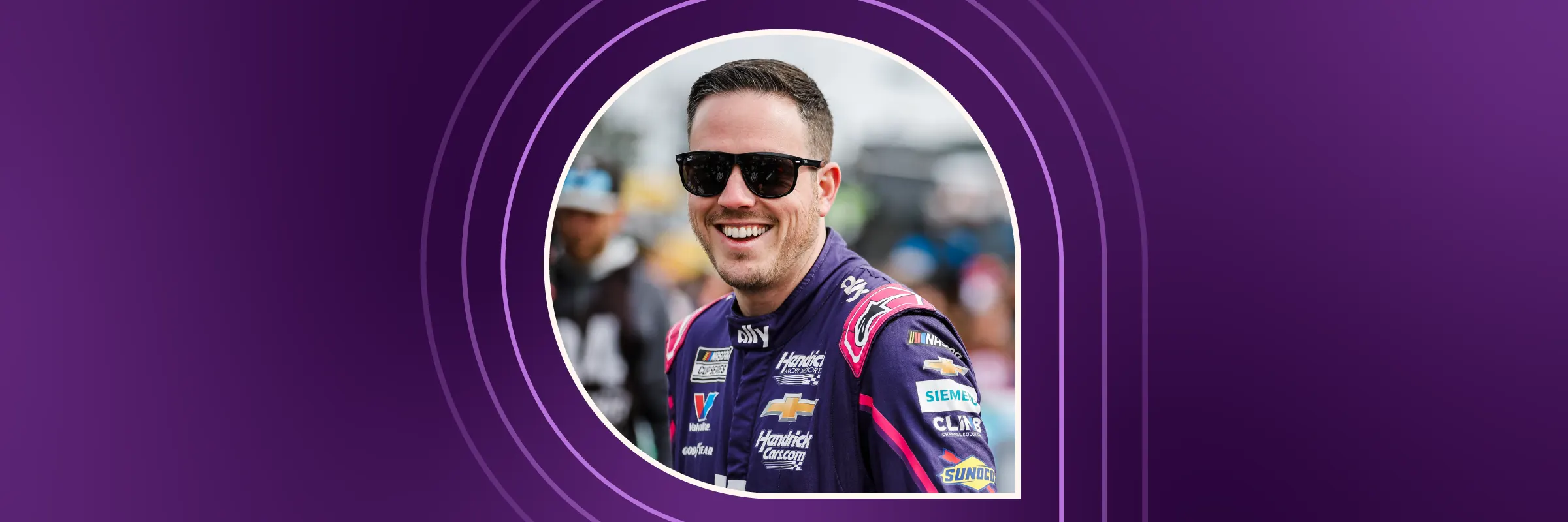 Alex Bowman, driver of Hendrick's #48 racecar smiles to fans at Daytona.