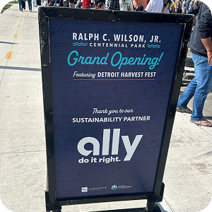 A sign at the grand opening of Ralph C. Wilson, Jr. Centennial Park thanking Ally as the sustainability sponsor