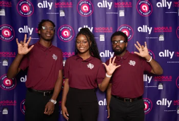 three HBCU students posing at a Moguls in the Making event