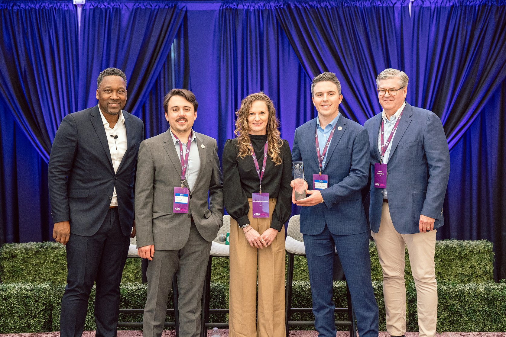 A smiling group of Ally suppliers